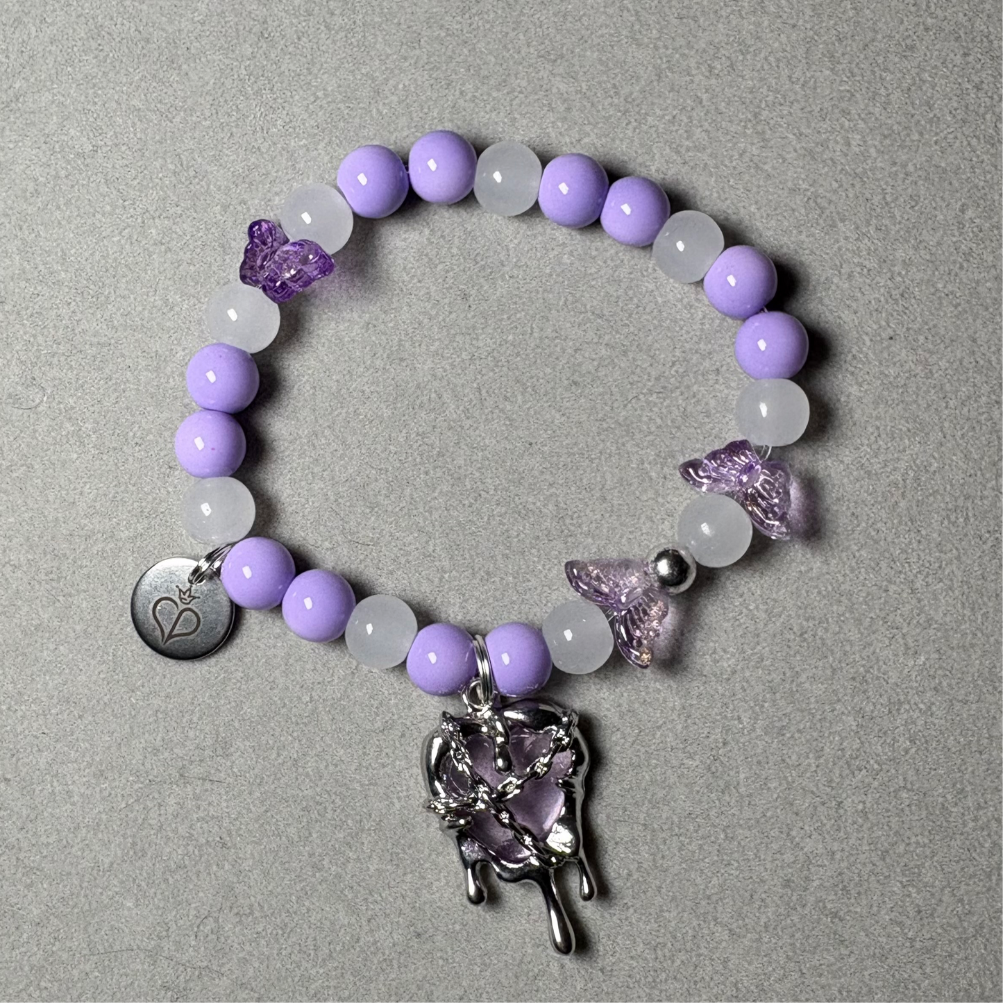 Purple and White Frosty Bead Charm Bracelet